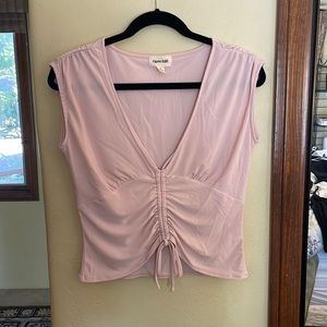 Open edit light pink top with drawstring